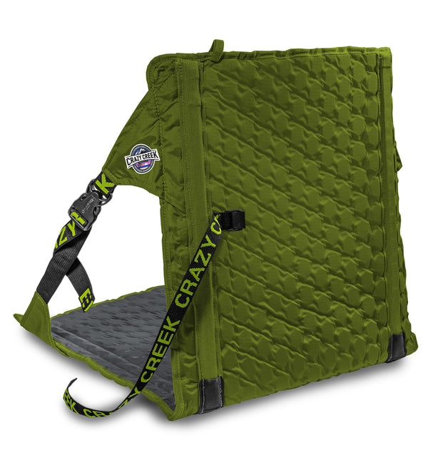 Olive Green Hex 2.0 Crazy Creek Chair folded out sitting on White - Looking at the back