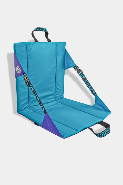 Turquoise and purple comfortable camping chair with straps on a white background
