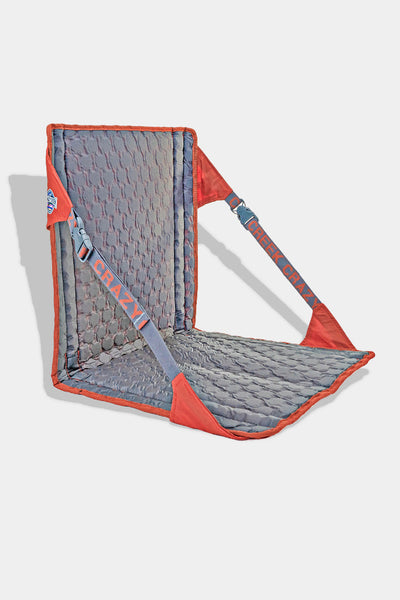 Gray and red backpacking chair on a white background