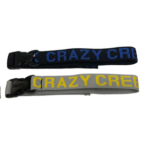 Two Crazy Creek straps with buckles laying on a white background